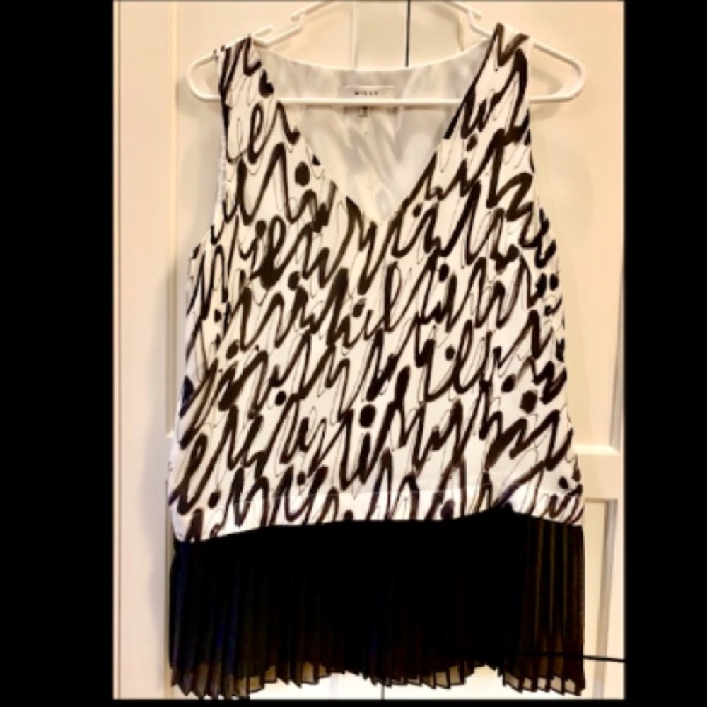 Elegant Milly sleeveless silk blouse/ top.